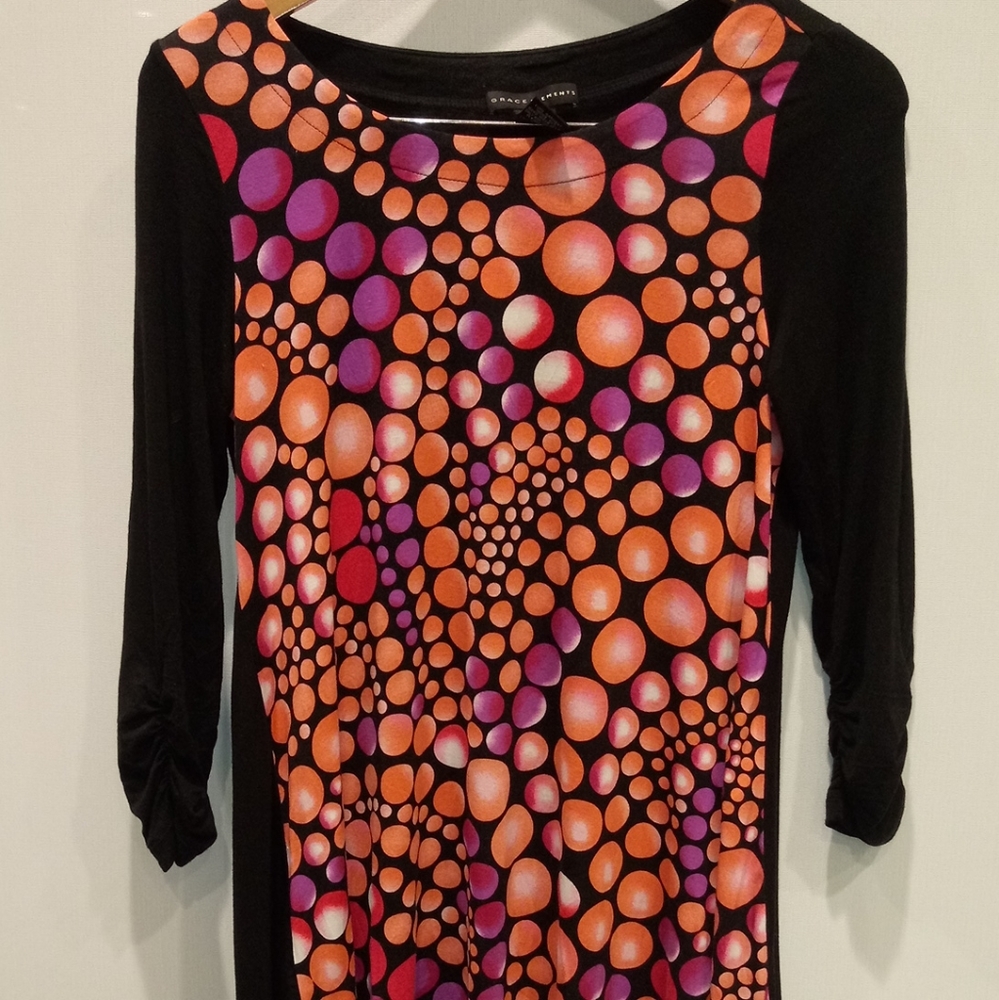 Cozy sphere blouse with uneven zig zag hem